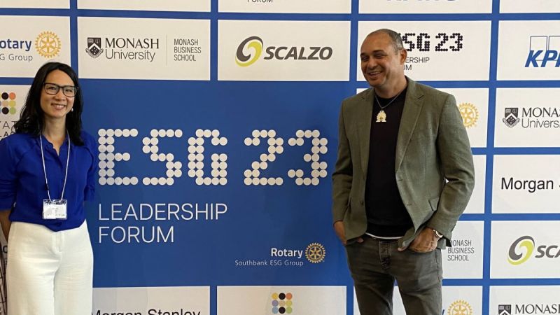 Dr Elaine Pratley, an Asian woman, posing with Thomas Mayo, an Australian Aboriginal man, at the ESG23 leadership forum