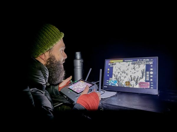 Our technician Harry remotely piloting a drone to detect heat signatures of mammals in trees via thermal infrared camera. Captured in a mixed hardwood plantation near Near Yarram, South Gippsland, Victoria, Gunaikurnai Traditional Lands.