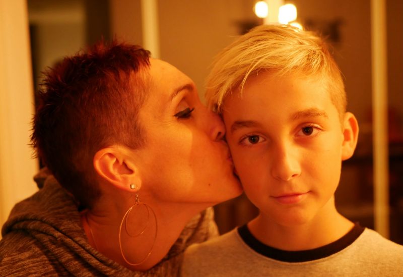 Mum and young teen have a happy moment together
