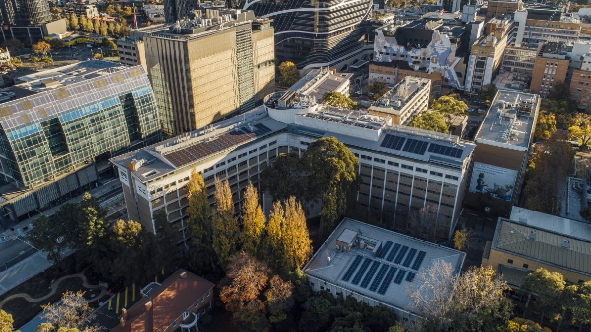 A drone looks down on the Parkville medical precinct, including the Royal Melbourne Hospital faintly visible in the background