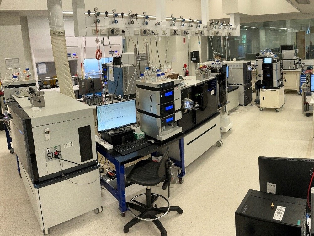 Main Proteomics section of the lab showing rows of instrumentation.